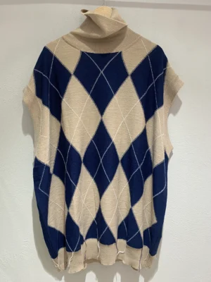 Smanicato in maglia over